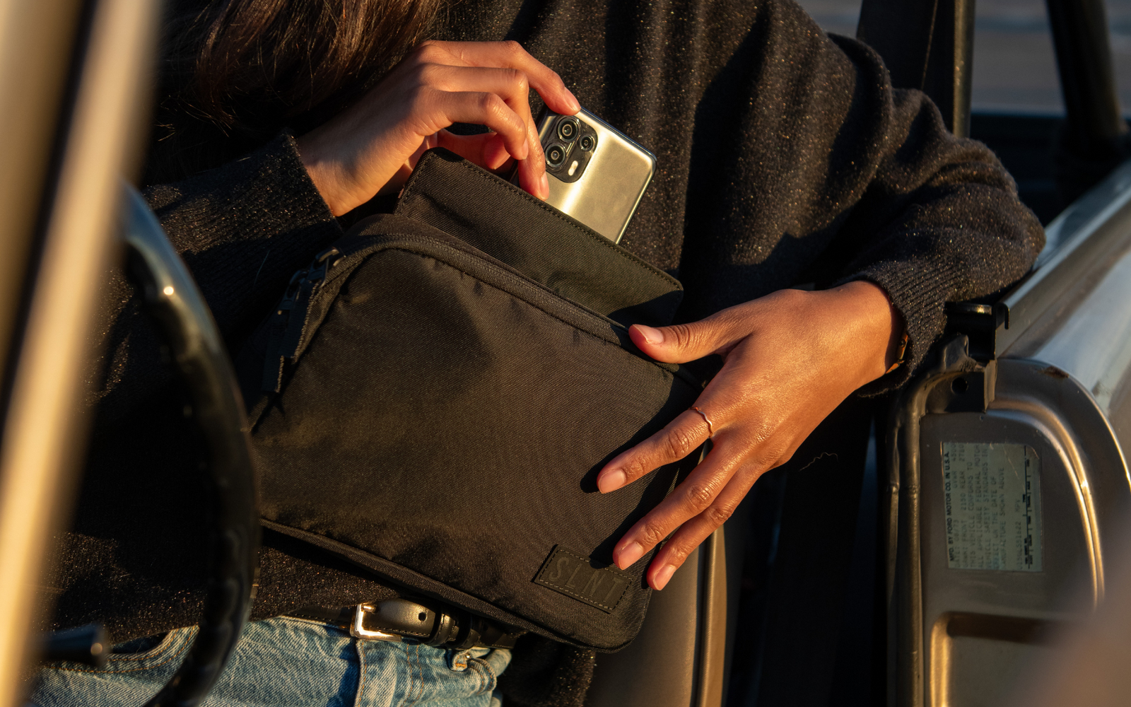 Women with SLNT Faraday Bag