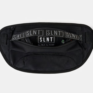 Essentials Faraday Sling open with tech accessories
