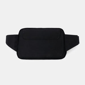 Compact black sling bag with a built-in Faraday cage, blocking RFID and wireless signals.