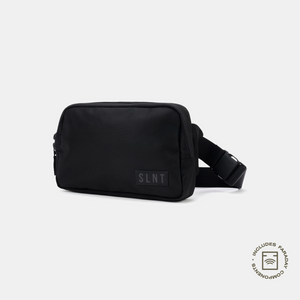 A black RFID-blocking sling by SLNT with a sleek, minimalist design. This Faraday bag blocks EMF radiation, prevents RFID scanning, and shields electronic devices from tracking, making it ideal for privacy-conscious travelers