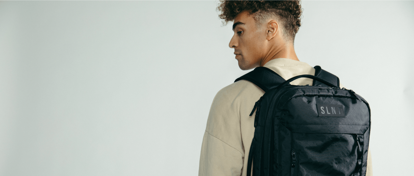 Man Wearing SLNT E3 Faraday Backpack